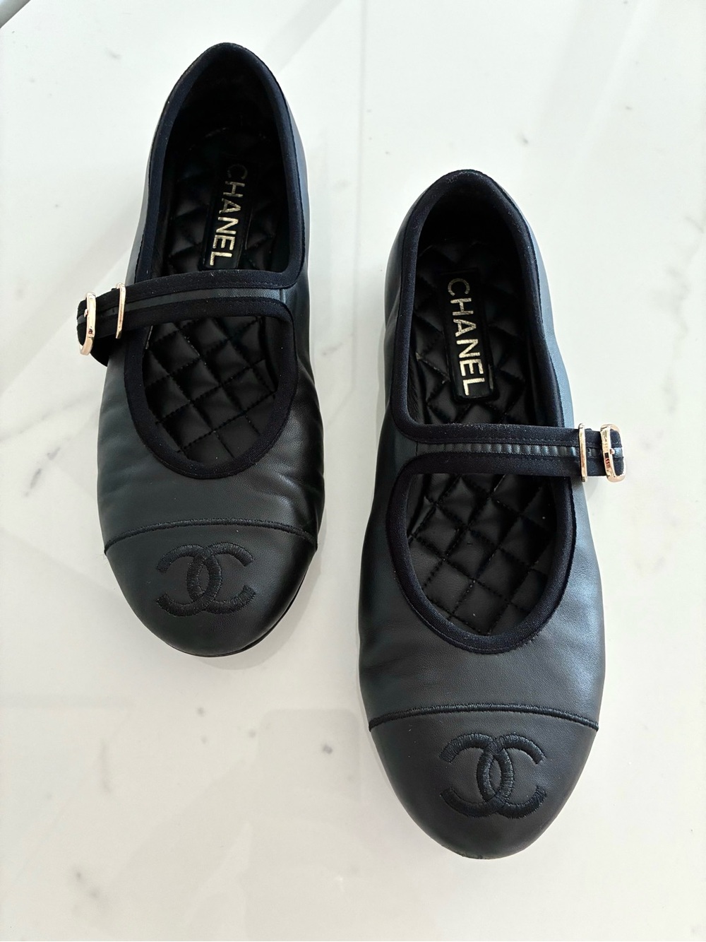 CHANEL Black Quilted Leather Mary Jane Flats with Gold Buckle